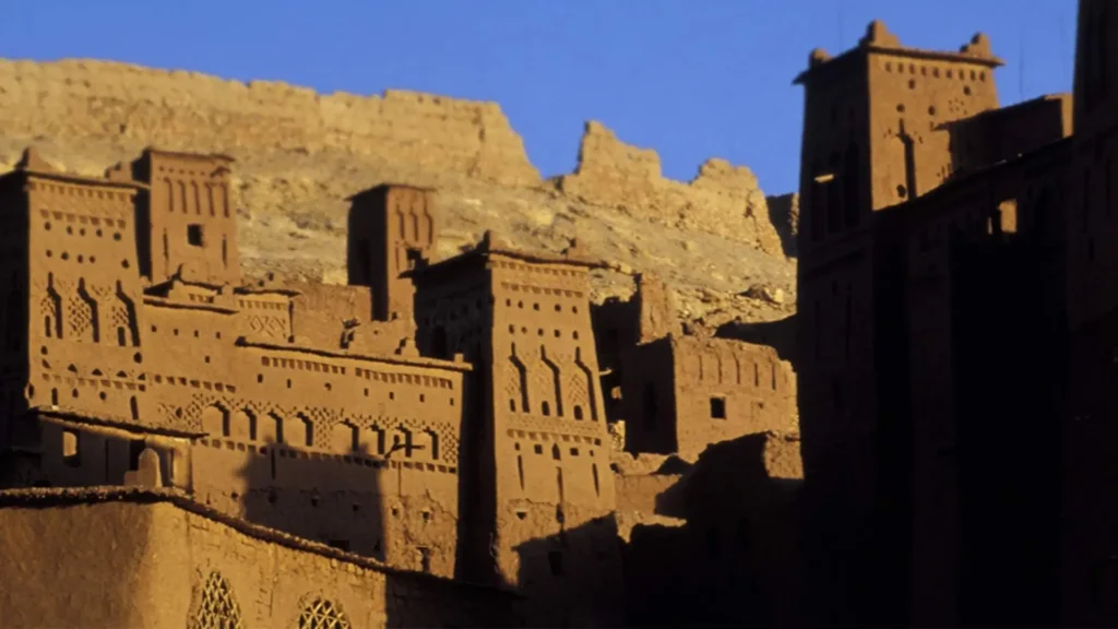 The ancient earthen architecture of Ait Ben Haddou kasbah, a UNESCO site that embodies the cultural depth behind tourism investment in Morocco.