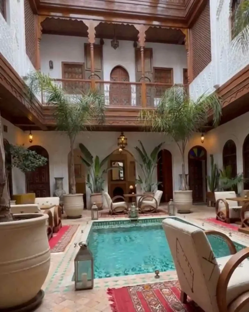 This image, featured in the article Marrakech Travel Guide 2026, shows a riad, a traditional Moroccan house or palace.