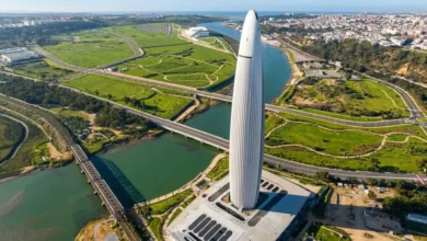 Aerial view of the Mohammed VI Tower in Rabat overlooking the Bouregreg Valley and modern infrastructure — a symbol of the ambition behind tourism investment in Morocco.