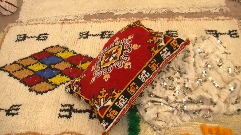 Handwoven Beni Ourain rug with Amazigh geometric patterns — Berber rugs are a top-tier choice for what to buy in Morocco