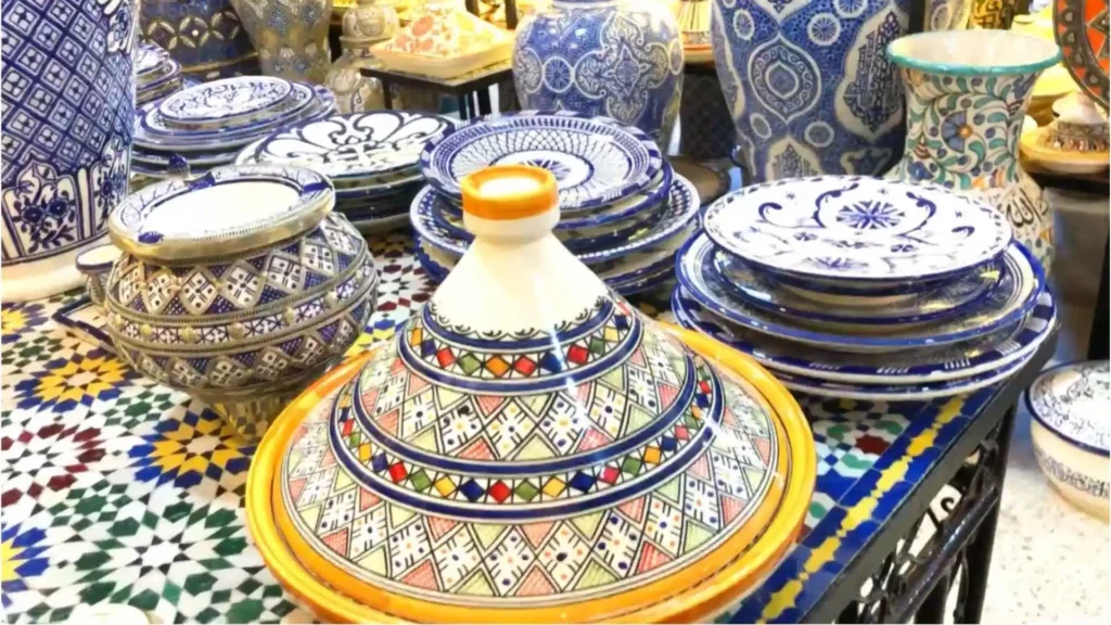 Hand-painted blue and white Fassi ceramics and a decorated tagine